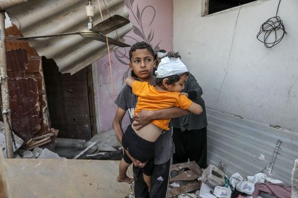 Gaza child receiving aid